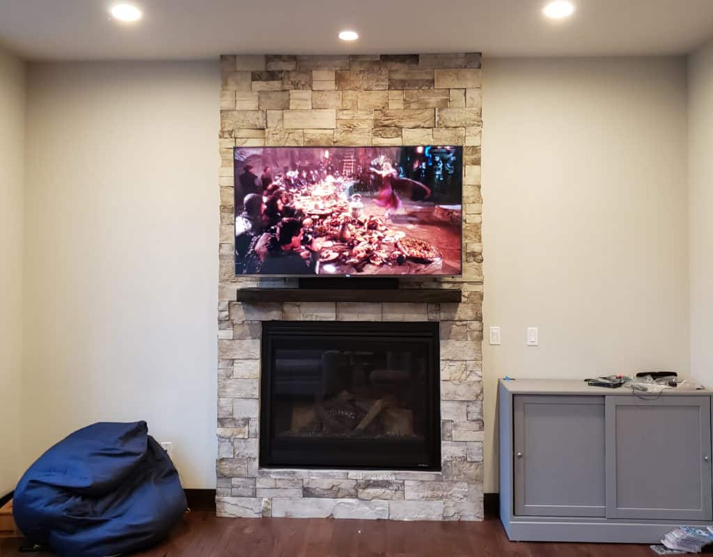 tv installation fireplace brick